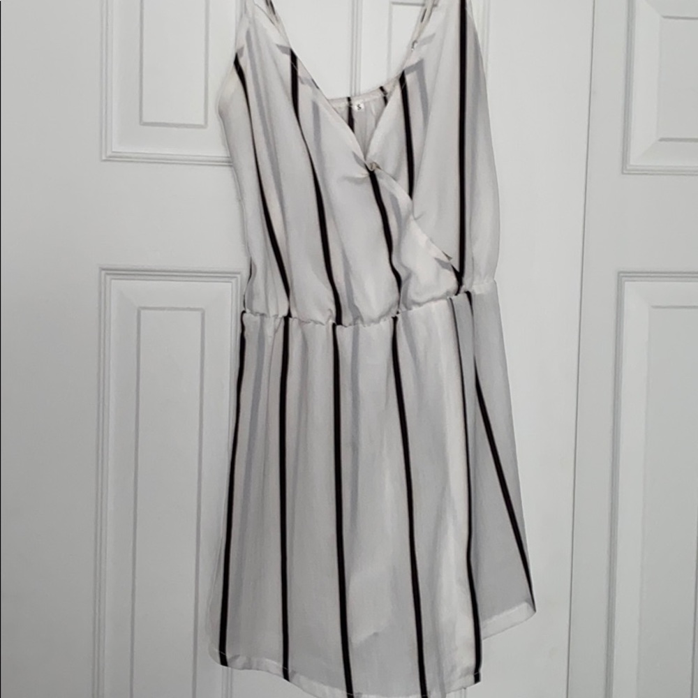 White with black striped romper